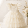 Ivory girls party dress with lace bodice, layered tulle skirt and ruffled sleeves displayed for ActiveKids kids shop.