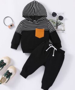 Toddler wearing a black striped baby tracksuit with matching jogger pants from ActiveKids Kenya.