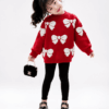 Back view of girls red bow knit sweater showing full rib-knit hem and bow pattern, kids clothes Kenya