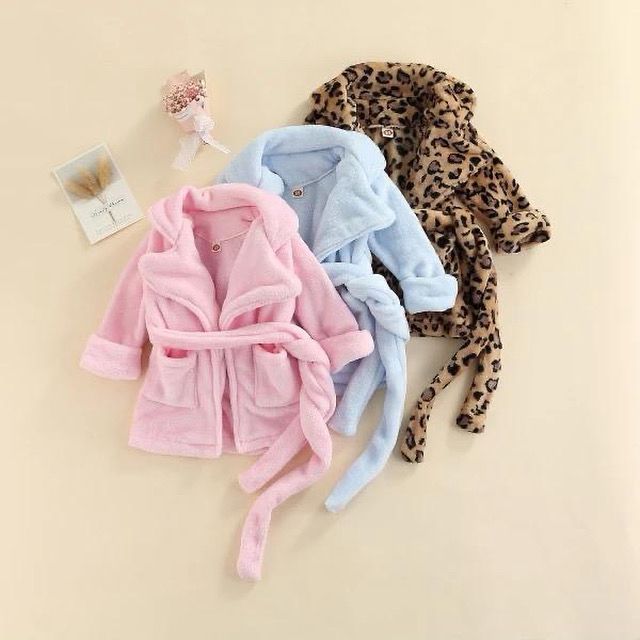 Best Baby Bathrobe In Nairobi | Soft Hooded Baby Robe – Activekids 6 Pink, blue and leopard print baby bathrobes displayed flat, sold by ActiveKids baby shop in Nairobi for baby clothes and baby essentials.