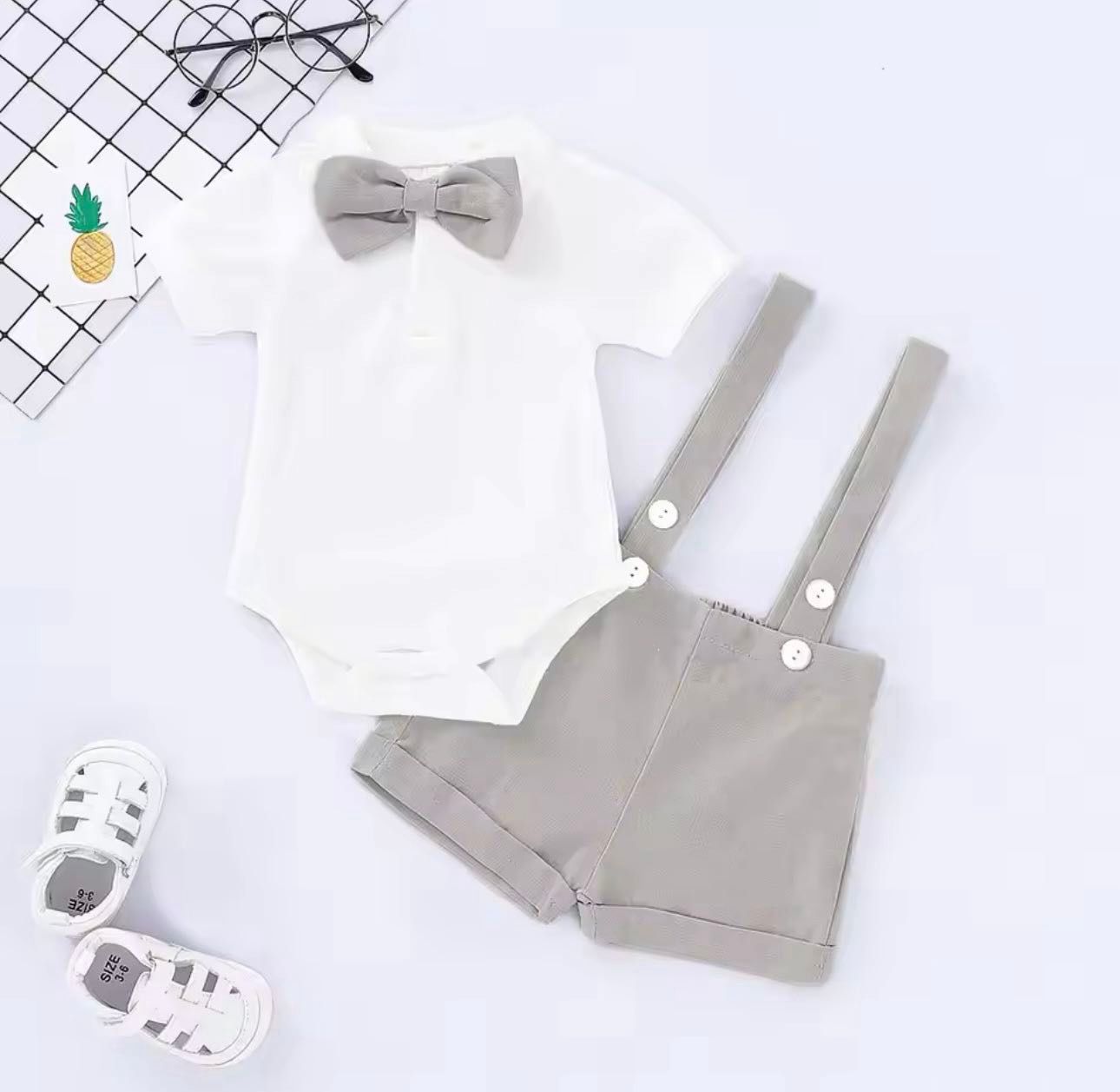 Baby Boy Suspender Outfit Set Nairobi | Activekids Baby Shop Nairobi 1 Baby boy suspender outfit set with white shirt, grey bow tie and grey shorts from ActiveKids baby shop in Nairobi